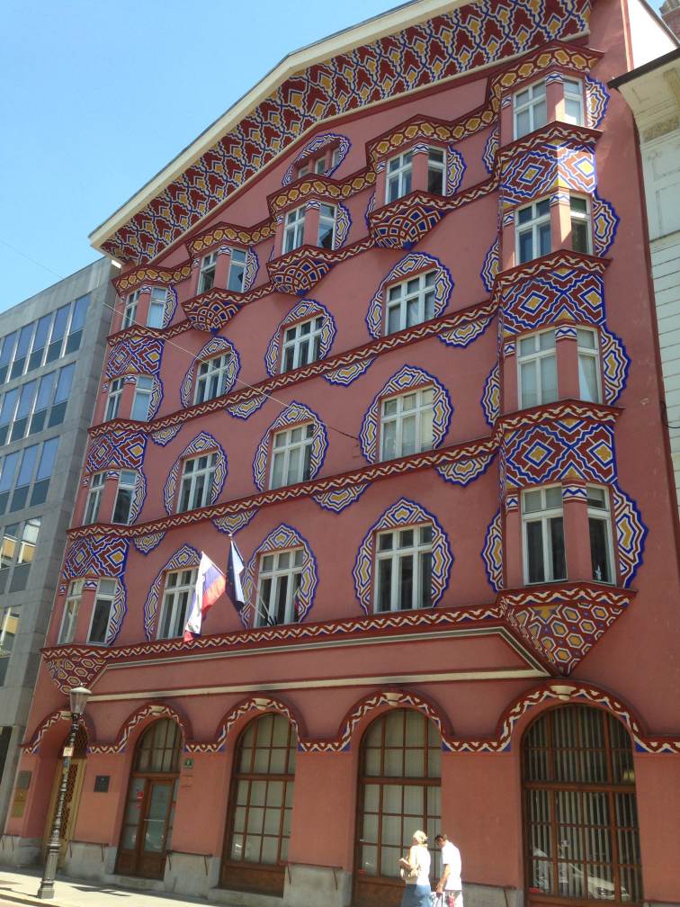 1922 Cooperative Bank Building by Ivan Vernik. He was trying to create a signature architectural style for Slovenia; he certainly created a signature, hard-to-miss landmark for tourists!