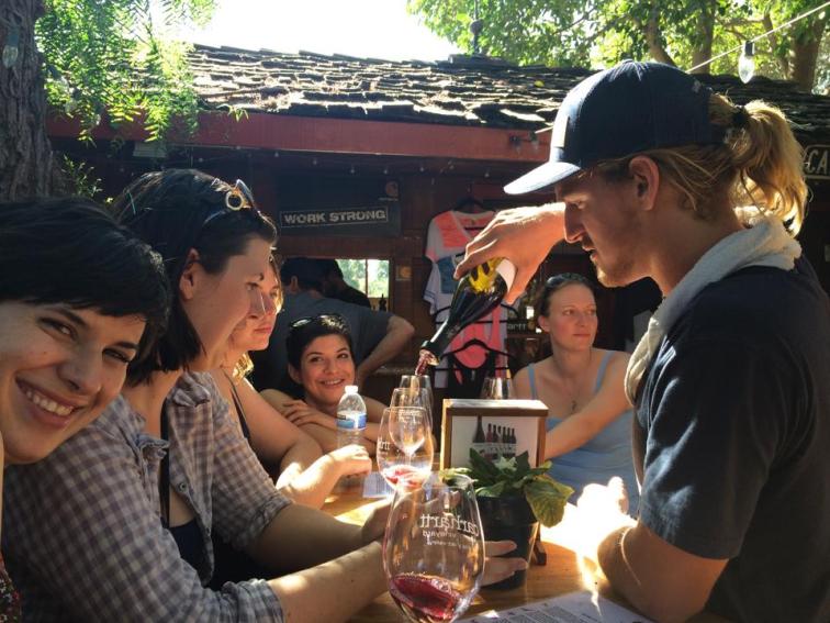 Barefoot server dude at Carhartt winery.